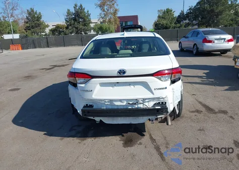 2021 Toyota Corolla Hybrid Le z USA, uszkodzony, nr VIN JTDEAMDE8MJ008542